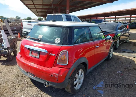 2010 Mini Cooper z USA, uszkodzony, nr VIN WMWMF3C56AT222133